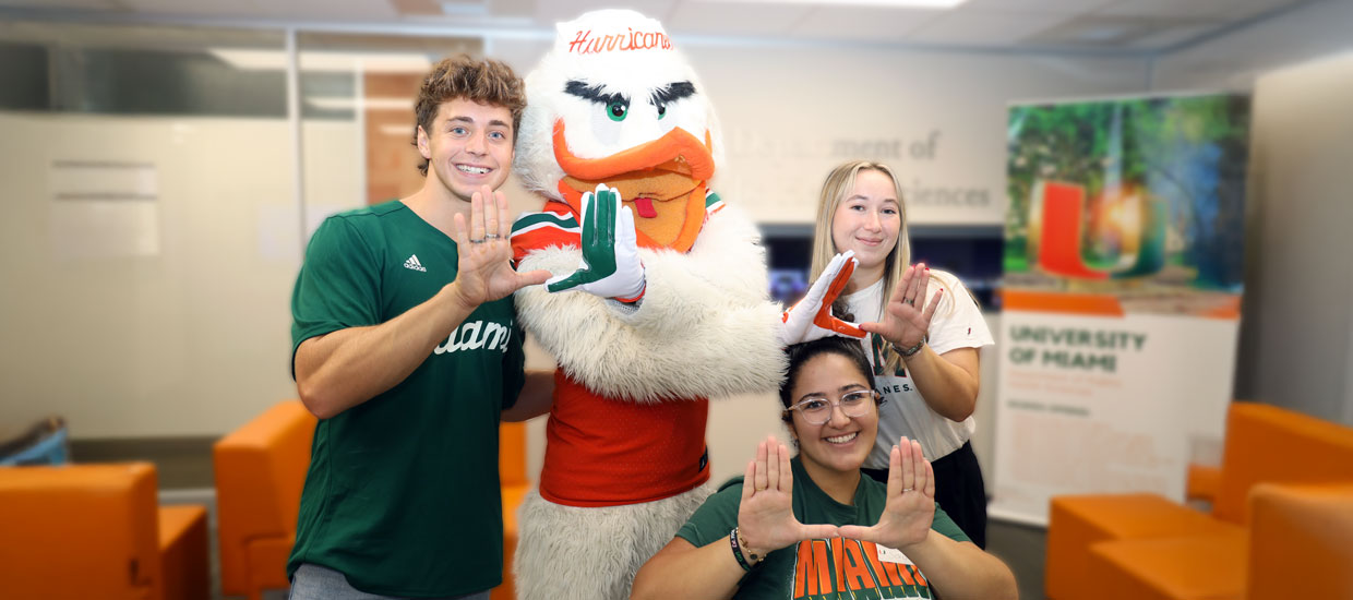 Students with Sebastian doing the U sign